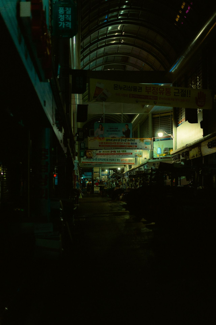 a street with signs and people